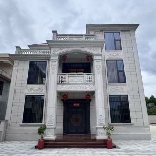 邵阳 芝麻白石材别墅干挂案例展示